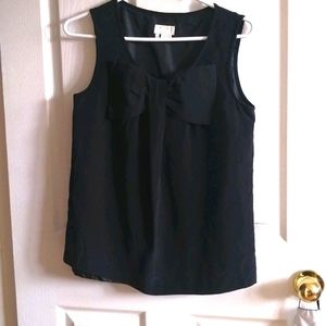 Sleeveless top with bow